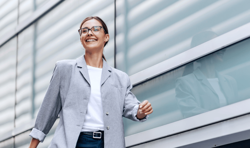 img-woman-walking-with-smile-on-her-face